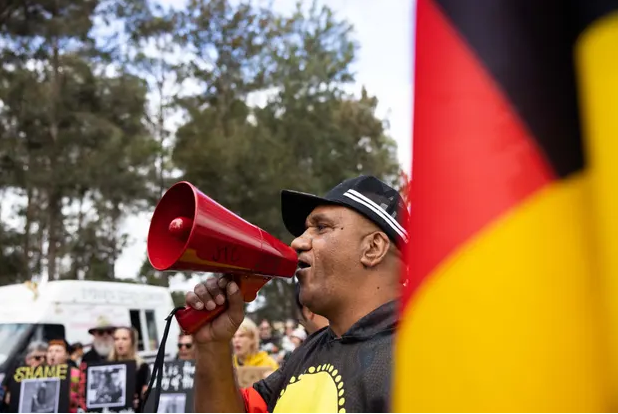 ‘We need to come up with some solutions together'. Desmond Blurton of the Deaths in Custody Watch Committee addresses the rally outside Banksia Hill juvenile detention centre in Perth. Photograph: Blake Sharp-Wiggins/The Guardian