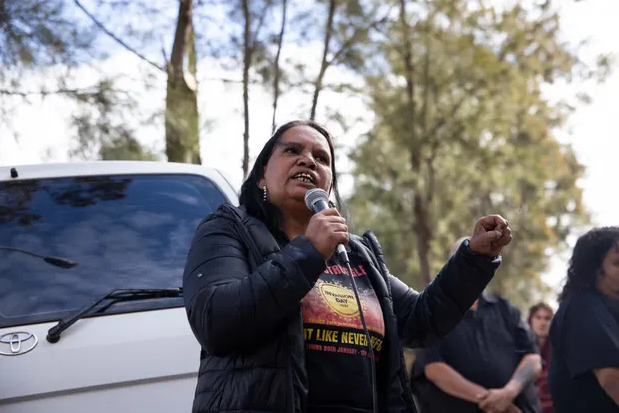 ‘We know that the prison crisis is absolutely catastrophic across this country,’ Megan Krakouer tells protesters. Photograph: Blake Sharp-Wiggins/The Guardian