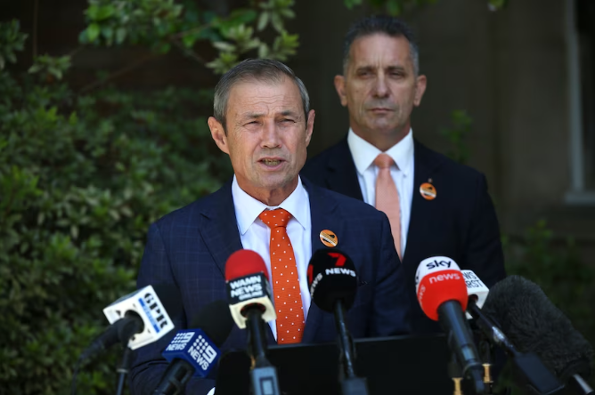 WA Premier Roger Cook and Corrective Services Minister Paul Papalia held a media conference to announce plans for the new centre. (ABC News: James Carmody)