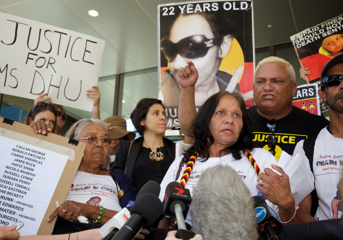 Carol Roe (L) grandmother and Della Roe (C), mother of Ms Dhu outside the coroner's court in Perth. Image: Richard Wainwright (AAP)