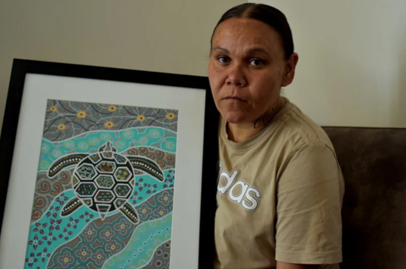 Cleveland Dodd’s mother, Nadene, with the last piece of artwork he produced in Unit 18. (Jesinta Burton)