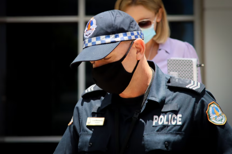 lee-bauwens-racist-text-messages Sergeant Lee Bauwens was one of a number of NT Police officers who was revealed at the Kumanjayi Walker inquest to have sent racist text messages. (ABC News: Hamish Harty)